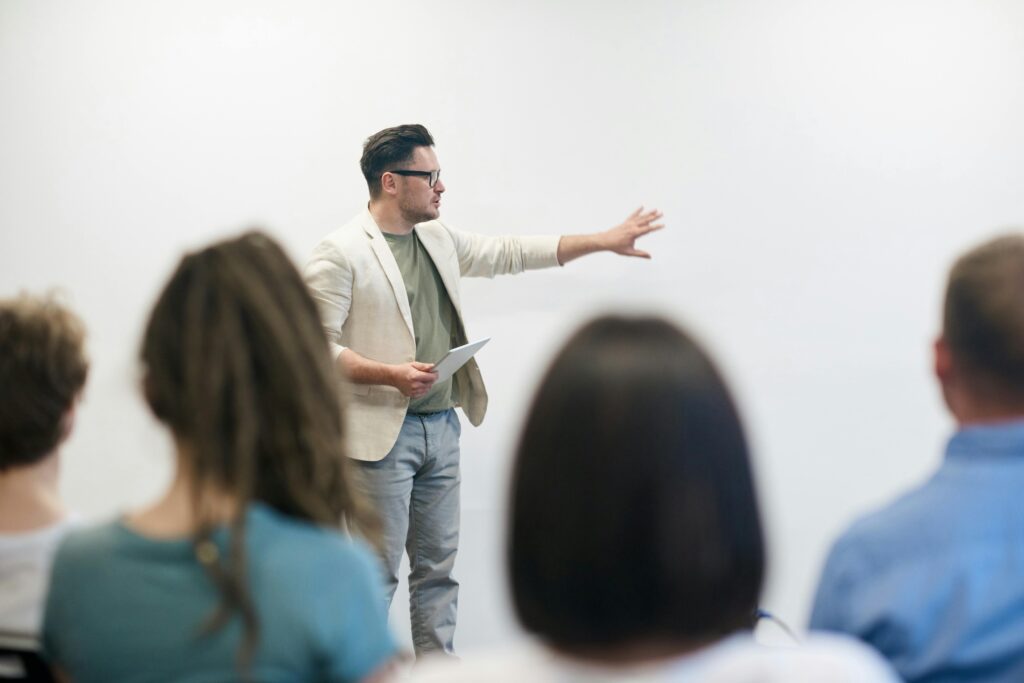 man teaching in a classroom