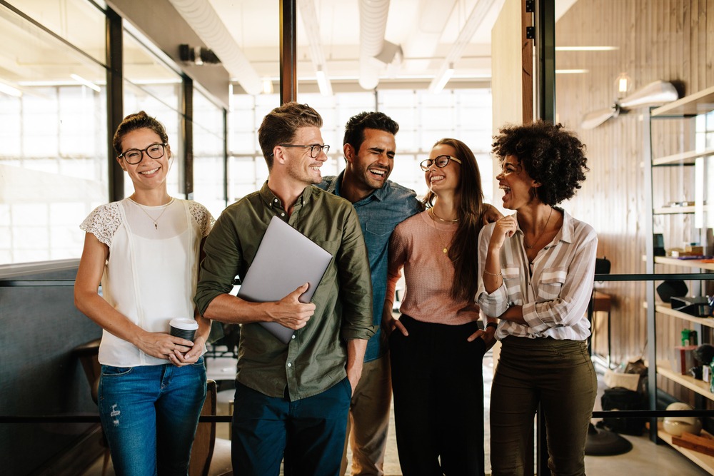 successful business team laughing in an office